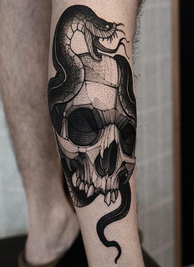 back tattoo of a snake by Marco Biondi: TattooNOW